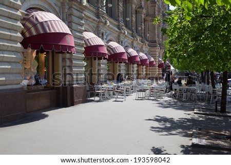 MOSCOW - MAY 12: Summer restaurant near the GUM building on May 12, 2014 in Moscow. GUM is one of the largest stores in Russia.