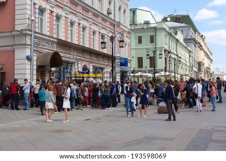 MOSCOW - MAY 12: Young people (entrants) standing near Moscow Art Theater School on Kamergersky street on May 12, 2014 in Moscow.