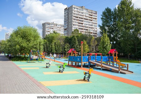 MOSCOW - AUGUST 2: Playground and residential buildings in Heritage Village Park in Bibirevo district on August 2, 2013 in Moscow. Bibirevo is district of North-Eastern part of Moscow, Russia.