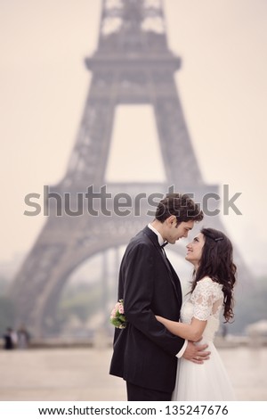 Happy Bride And Groom Enjoying Their Wedding In Paris