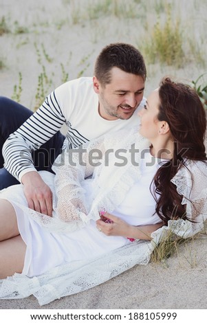 Seaside photo session of a beautiful young couple
