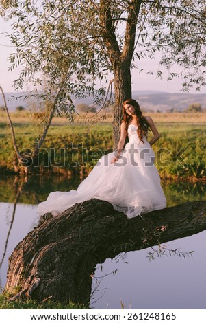 Stunning and beautiful bride dreaming in her wedding day