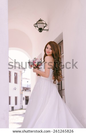 Beautiful bride with a long red hair