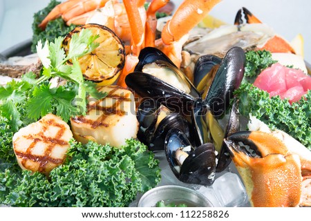 Seagood Platter: A close-up of a beautiful gourmet seafood platter with a variety of shellfish, crustaceans and fish