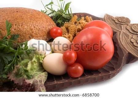 Breads and pasta, fresh herbs and tomato