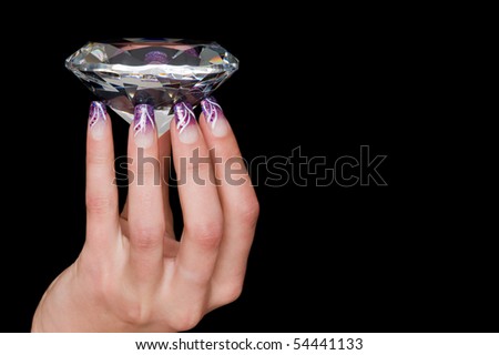 A hand with a diamond
