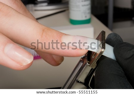 A nail designer at work