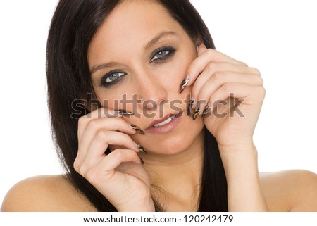 beautiful young woman with fresh manicure stylish nails