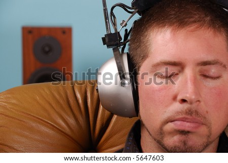 stylish man with goatee and vintage headphones