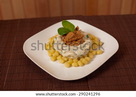 gnocchi and blue cheese sauce with spinach