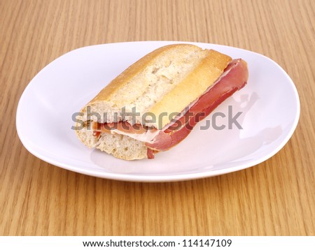 Cured ham Sandwich. Typical spanish sandwich made with cured ham and baguette bread.