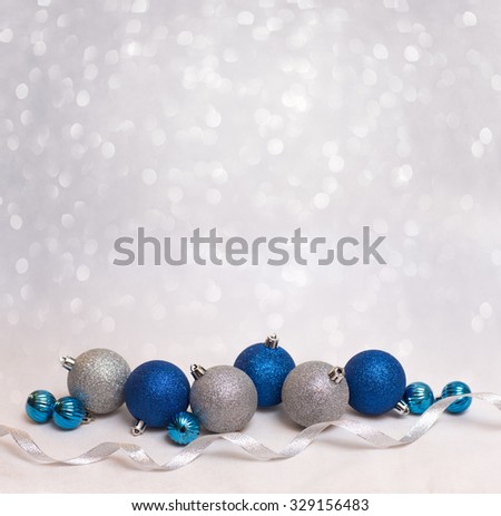 Beautiful Christmas background with blue and white christmas balls for xmas design