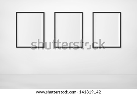 Art Exhibition Concept. 3 Blank Photo Frames on display at an exhibition. Put your own image inside.