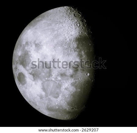 growing moon showing details of lunar surface