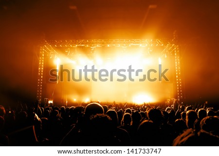 Rock Concert, Silhouettes Of Happy People Raising Up Hands