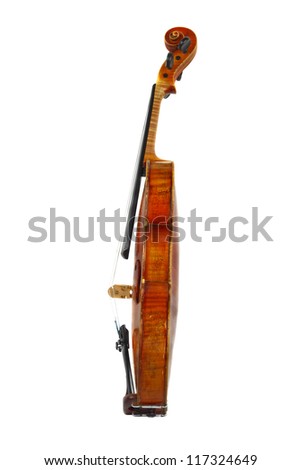 Profile view of old violin isolated on white