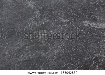 cracked black concrete wall /floor texture background