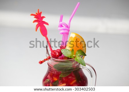 cocktail on white plate isolated white background