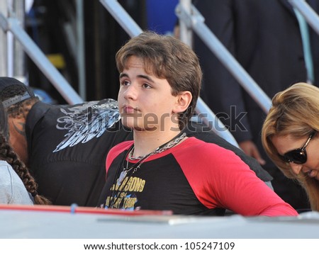 LOS ANGELES, CA - JANUARY 26, 2012: Michael Jackson\'s son Prince Michael Jackson placing his father\'s glove & shoe-prints in cement at the Chinese Theatre. January 26, 2012  Los Angeles, CA