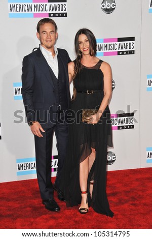 LOS ANGELES, CA - NOVEMBER 20, 2011: Alanis Morissette & Mario Treadway  at the 2011 American Music Awards at the Nokia Theatre, L.A. Live in downtown Los Angeles. November 20, 2011  Los Angeles, CA