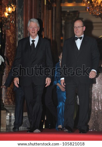 MONACO - MAY 23, 2012: President Bill Clinton & Prince Albert II of Monaco  at the inaugural Nights in Monaco Gala at the Hotel de Paris, Monte Carlo. May 23, 2012  Monaco