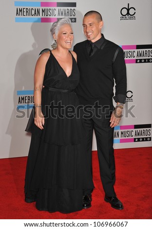 LOS ANGELES, CA - NOVEMBER 21, 2010: Pink & boyfriend at the 2010 American Music Awards at the Nokia Theatre L.A. Live.