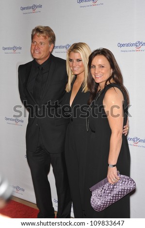 LOS ANGELES, CA - OCTOBER 2, 2009: Jessica Simpson & parents Joe & Tina Simpson at the Operation Smile Gala at the Beverly Hilton Hotel where the family were honored by the children\'s medical charity.