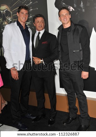 LOS ANGELES, CA - AUGUST 16, 2012: Sylvester Stallone & Olympic gold-medalists Conor Dwyer (left) & Ryan Lochte at the premiere of his movie \