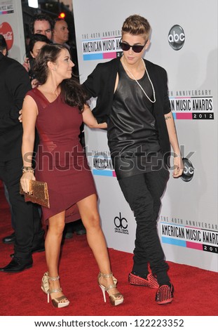 LOS ANGELES, CA - NOVEMBER 18, 2012: Justin Bieber & mother at the 40th Anniversary American Music Awards at the Nokia Theatre LA Live.