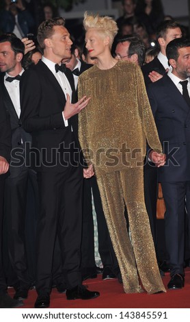 CANNES, FRANCE - MAY 25, 2013: Tom Hiddleston & Tilda Swinton at gala premiere at the 66th Festival de Cannes for their movie \
