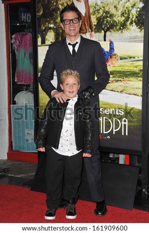 LOS ANGELES, CA - OCTOBER 23, 2013: Johnny Knoxville & Jackson Nicoll at the premiere of their movie \