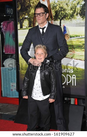 LOS ANGELES, CA - OCTOBER 23, 2013: Johnny Knoxville & Jackson Nicoll at the premiere of their movie \