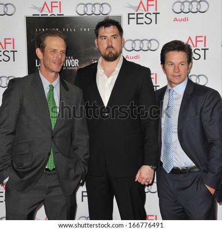 LOS ANGELES, CA - NOVEMBER 12, 2013: Mark Wahlberg with rtd Petty Officer Marcus Luttrell & writer/director Peter Berg (left) at the world premiere of \