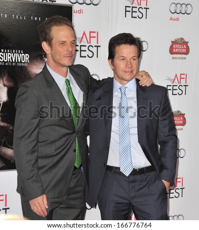 LOS ANGELES, CA - NOVEMBER 12, 2013: Writer/director Peter Berg (left) & Mark Wahlberg at the premiere of \