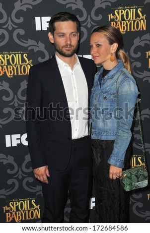 LOS ANGELES, CA - JANUARY 7, 2014: Tobey Maguire & wife Jennifer Meyer at the premiere of his TV series \