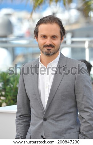 CANNES, FRANCE - MAY 18, 2014: Director Ned Benson at the photocall for his movie \
