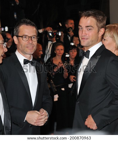 CANNES, FRANCE - MAY 18, 2014: Guy Pearce & Robert Pattinson at the gala premiere of their movie 