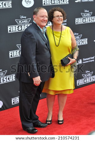 LOS ANGELES, CA - JULY 15, 2014: Executive producer John Lasseter & wife Nancy at the world premiere of his movie Disney\'s \