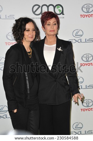 LOS ANGELES, CA - OCTOBER 18, 2014: Sharon Osbourne & Sara Gilbert (left) at the 2014 Environmental Media Awards at Warner Bros Studios, Burbank.