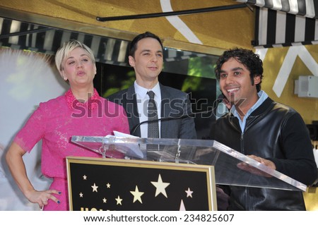 LOS ANGELES, CA - OCTOBER 29, 2014:  Kaley Cuoco & co-stars from The Big Bang Theory - Jim Parsons & Kunal Nayyar - on Hollywood Blvd where she received a star on the Hollywood Walk of Fame.