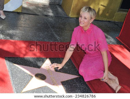 LOS ANGELES, CA - OCTOBER 29, 2014: Actress Kaley Cuoco on Hollywood Boulevard where she was honored with the 2,532nd star on the Hollywood Walk of Fame.