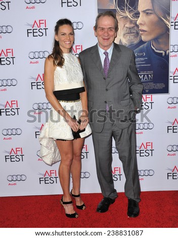 LOS ANGELES, CA - NOVEMBER 11, 2014: Hilary Swank & Tommy Lee Jones at the gala screening of their movie \