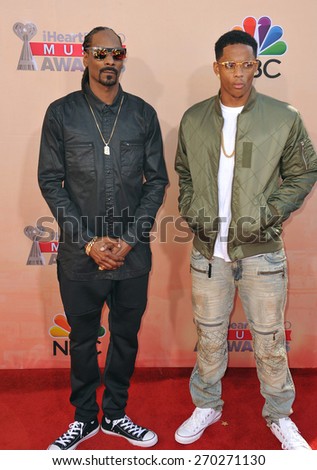 LOS ANGELES, CA - MARCH 29, 2015: Snoop Dogg & Cordell Broadus at the 2015 iHeart Radio Music Awards at the Shrine Auditorium.