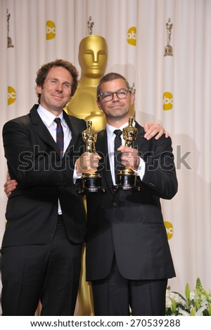 LOS ANGELES, CA - FEBRUARY 26, 2012: Kirk Baxter & Angus Wall, winner for Best Film Editing for The Girl With The Dragon Tattoo, at the 82nd Academy Awards at the Hollywood & Highland Theatre.