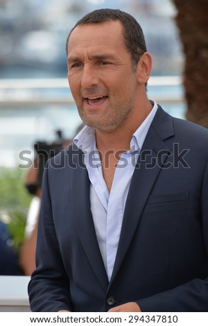 CANNES, FRANCE - MAY 18, 2015: Gilles Lellouche at the photocall for his movie \
