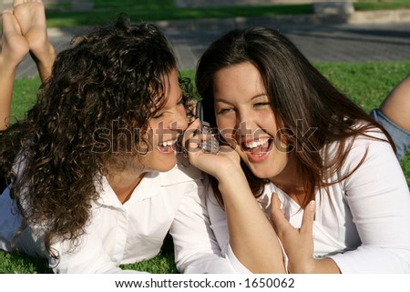cell phone backgrounds for girls. stock photo : 2 girls laughing