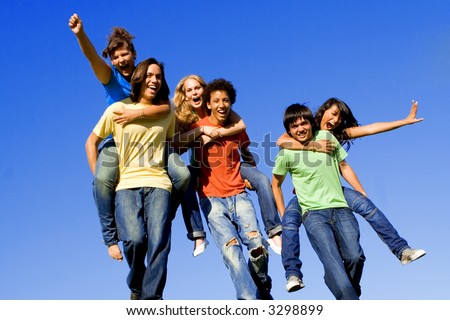 piggyback race diverse group of teens teenagers at summer camp