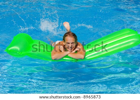stock photo happy teen in pool on summer vacation