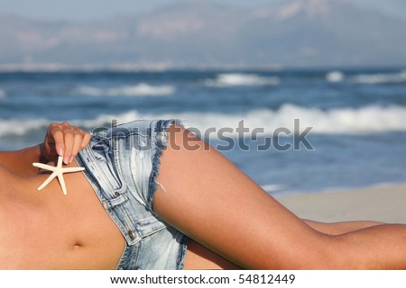 stock photo sexy beach woman sunbathing on vactions