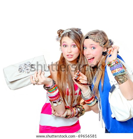stock photo : Happy teenagers Fashion girls wearing funky accessories whilst shopping